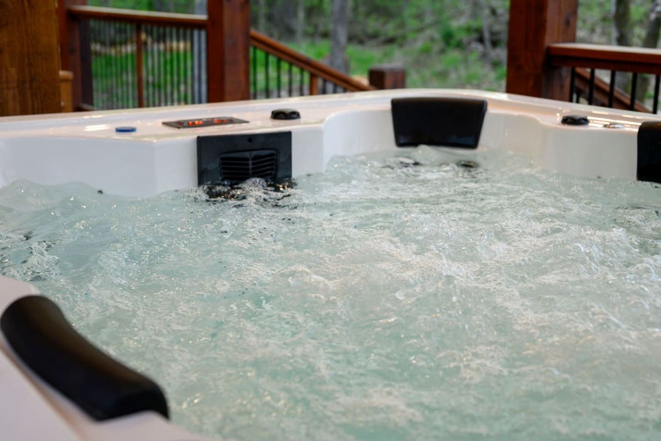 The modern bathroom features a spacious shower and elegant finishes.