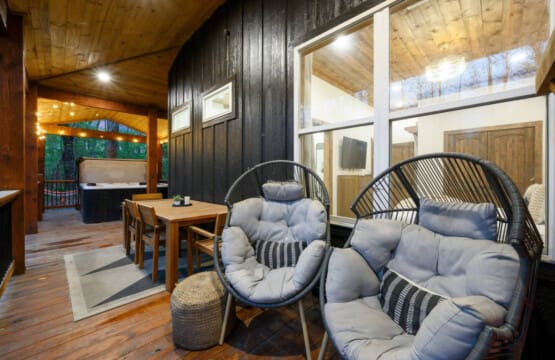 Relax outdoors on the spacious deck, perfect for enjoying the peaceful pond.