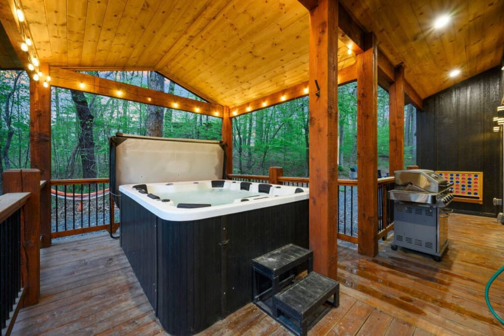 The modern bathroom features a spacious shower and elegant finishes.