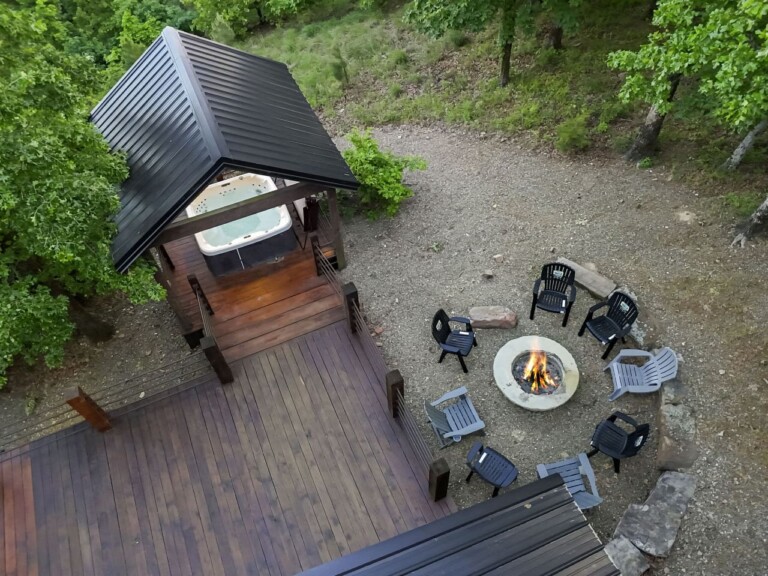 Gather around the stone fire pit and enjoy the private hot tub gazebo.