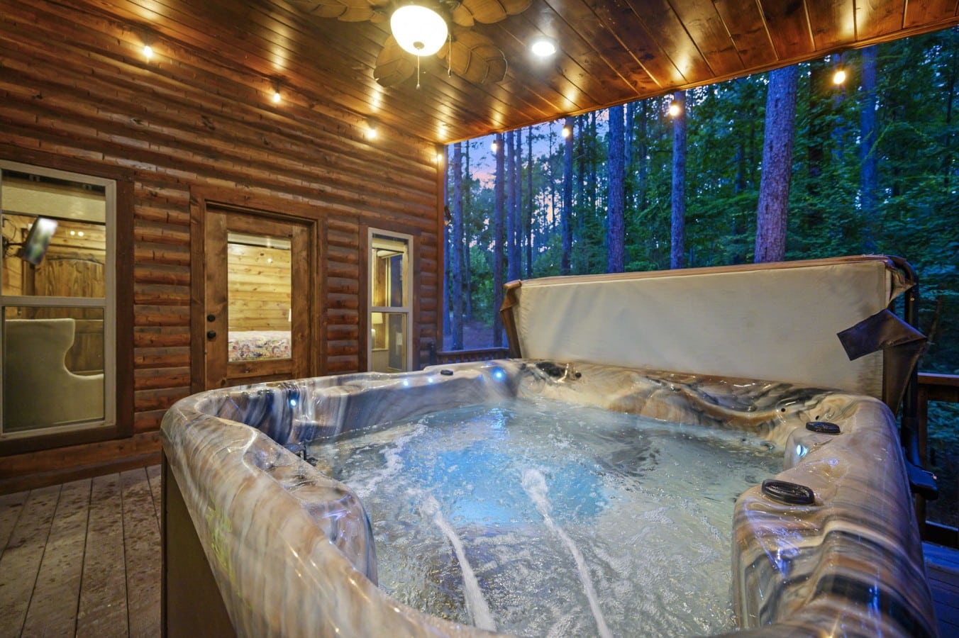 Slip into the bubbling hot tub at twilight and watch the pink sky fade to stars above the pines.