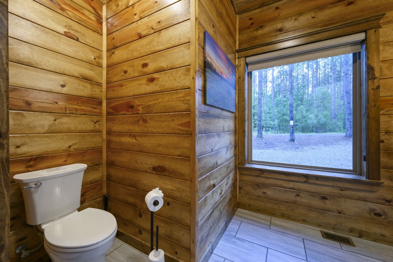Brush your teeth with a view of towering pines just outside the window.