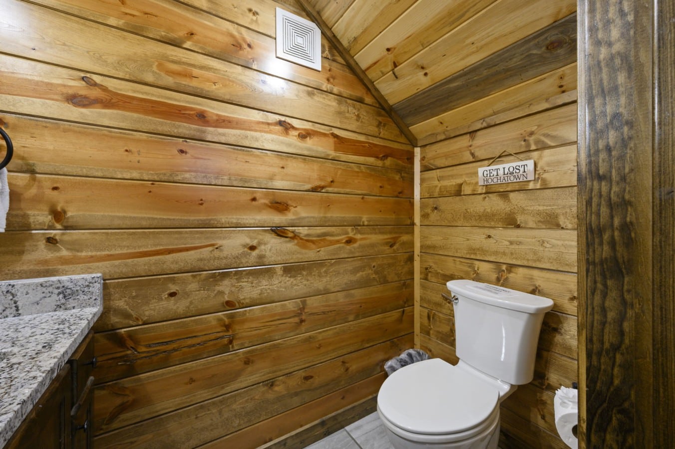 Local charm meets cabin personality u2014 even the bathroom gives you a Hochatown welcome.