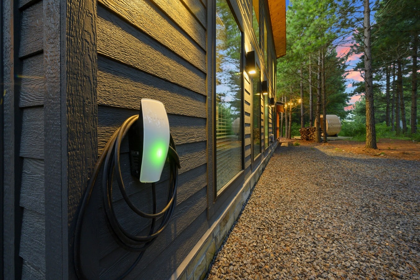 Exterior detail with EV charger for convenient cabin stays.