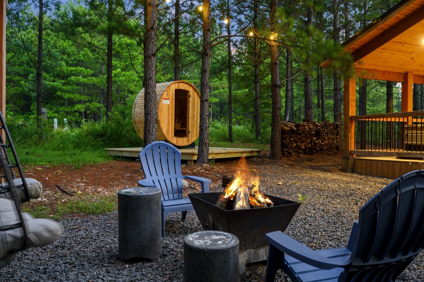 Fire pit, sauna, and covered deck arranged for easy outdoor evenings.
