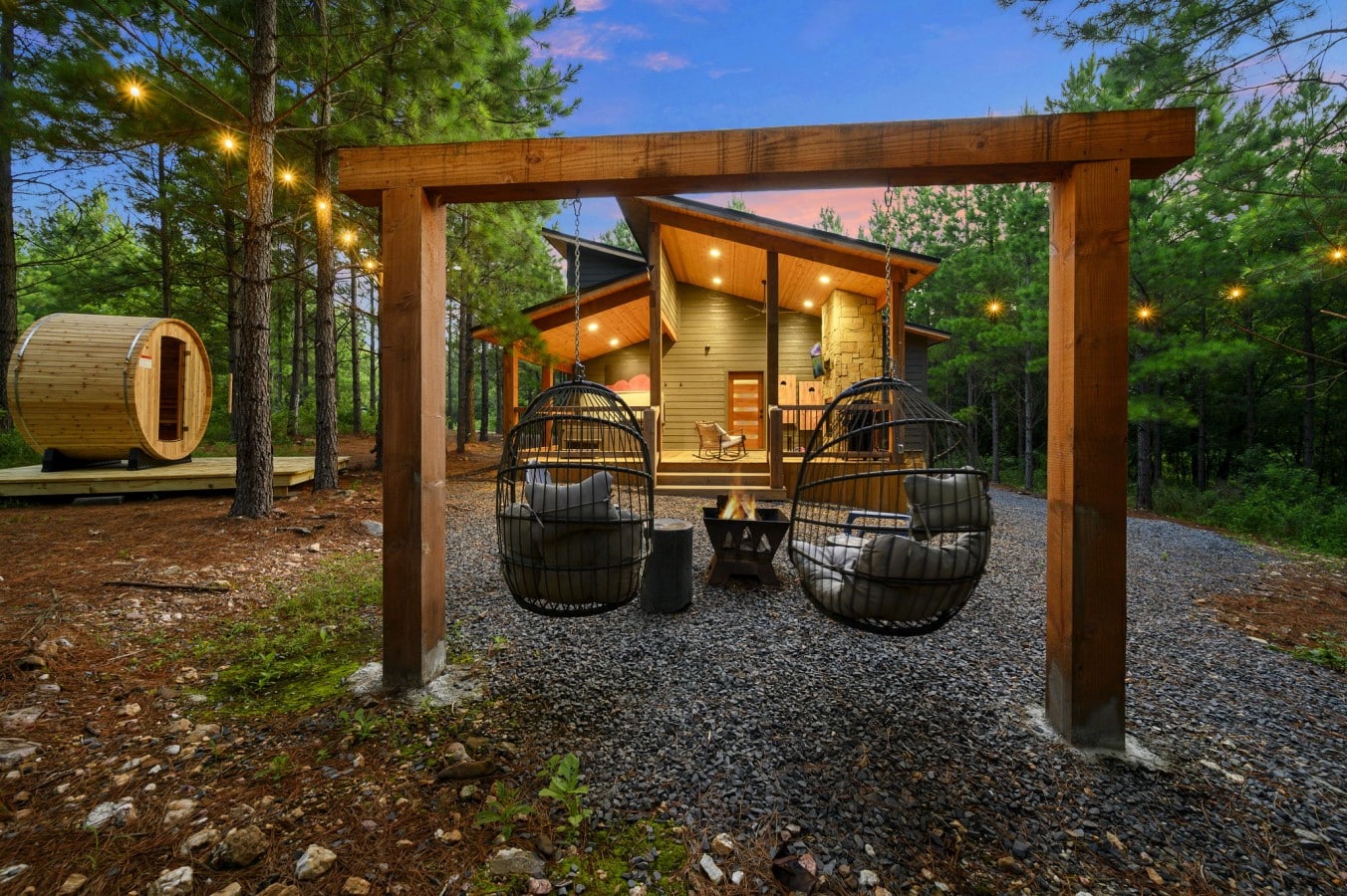 Hanging chairs and sauna create a relaxed retreat just off the cabin.