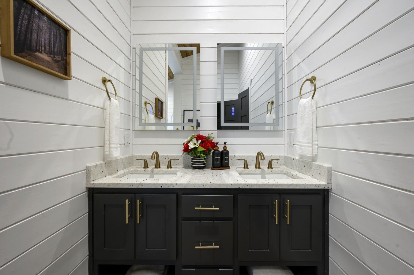 His-and-hers vanities and brass fixtures mean mornings feel luxurious, never rushed.