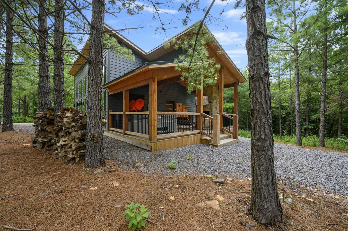 Firewood stacked and the back porch ready — tonight's bonfire is already calling.