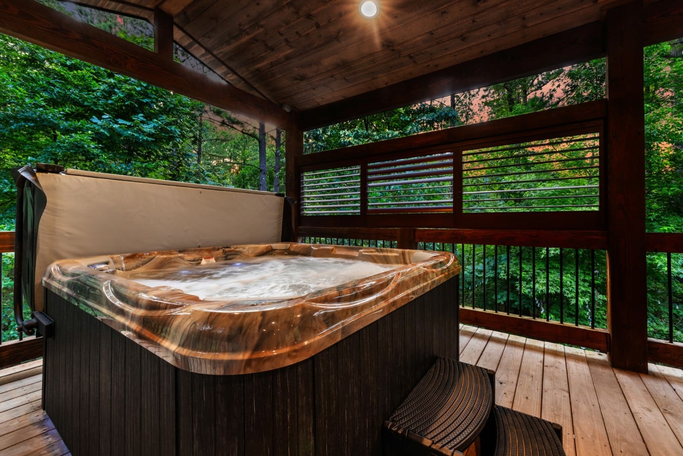 Hot tub close-up on the covered deck for a private soak.