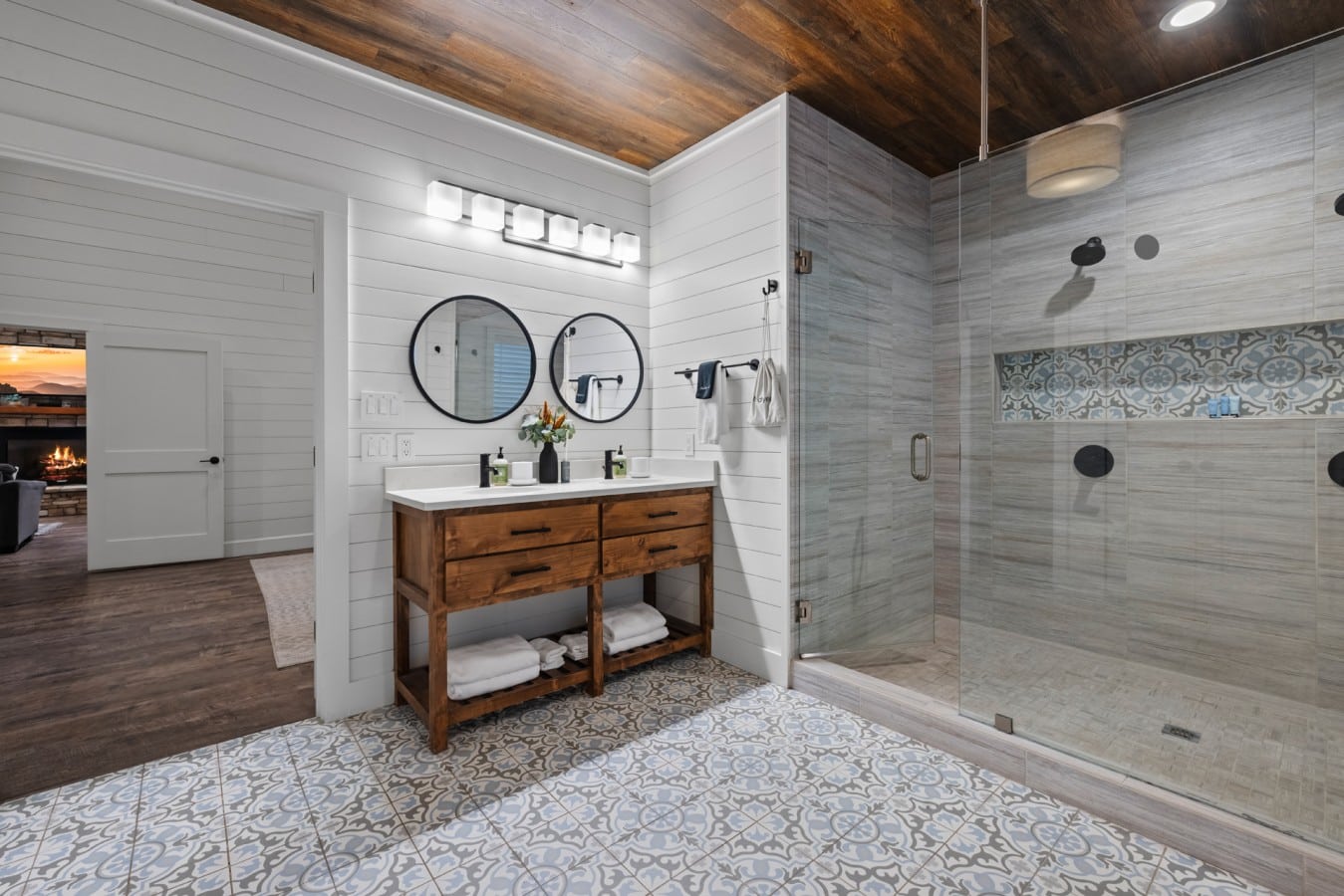 Double vanity and tile shower with a clean modern cabin finish.