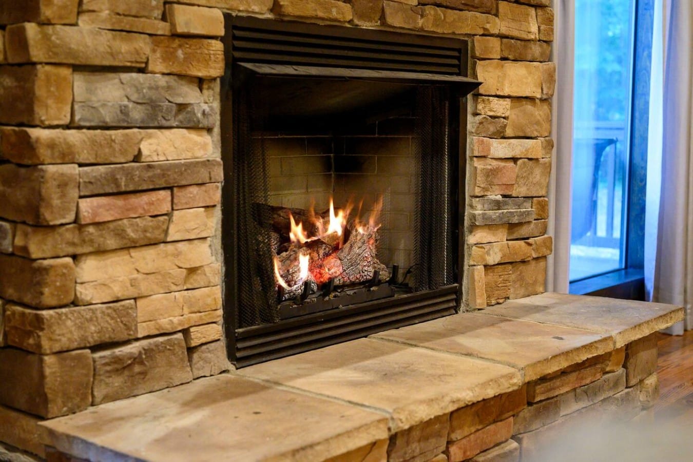 Stone fireplace detail in the main great room.