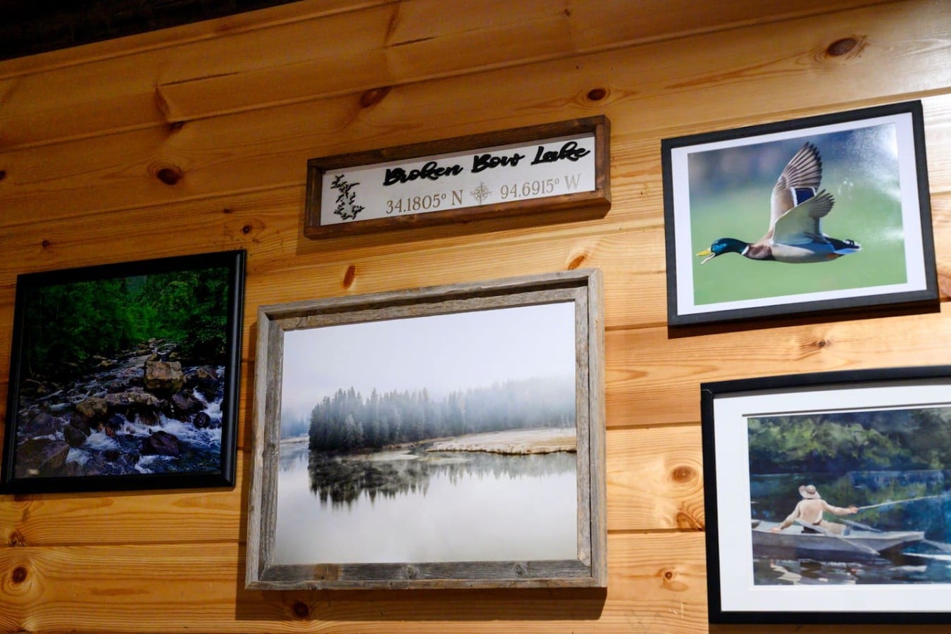 Adventure-themed wall art in the game room.