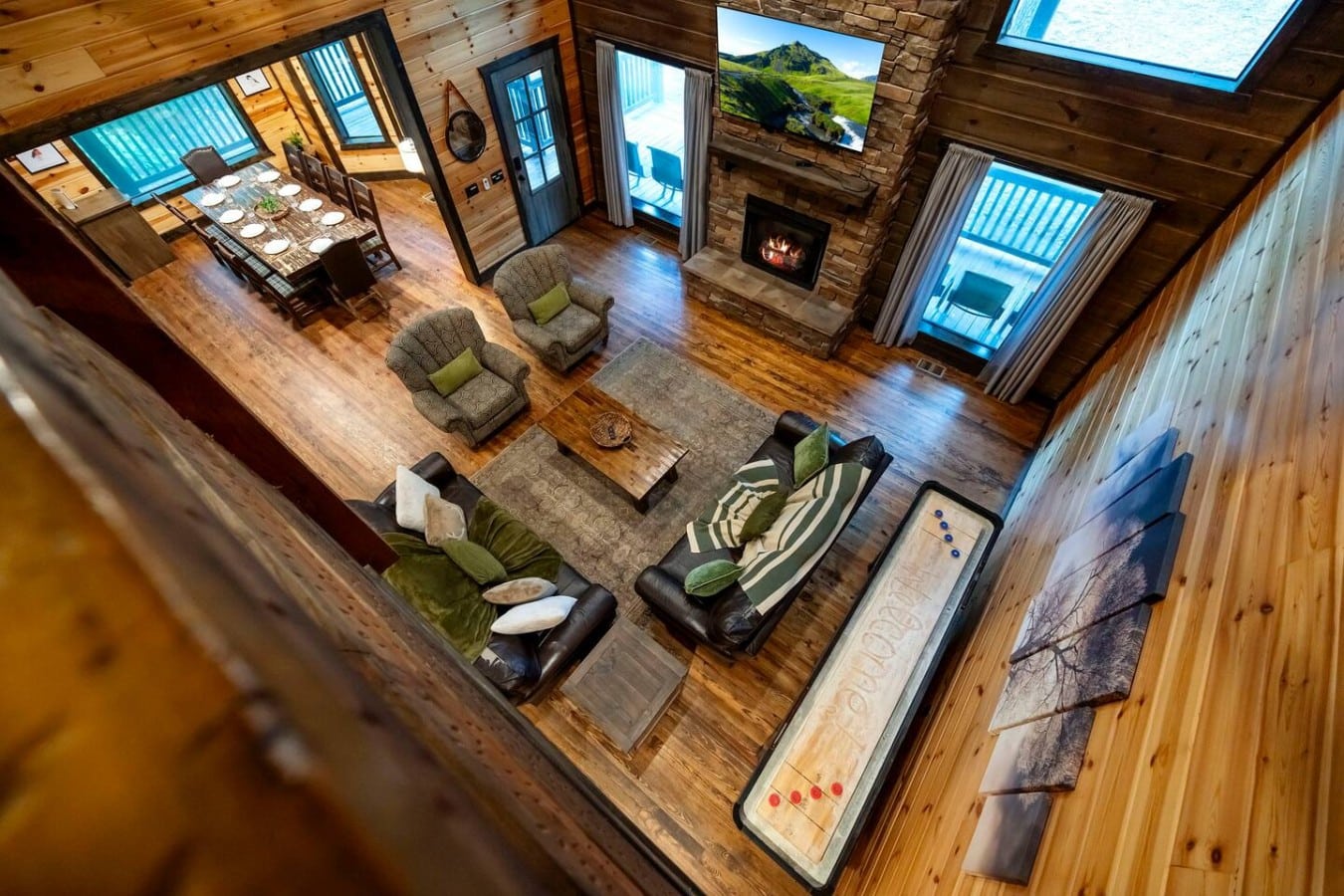 Loft overlook view down to the great room and shuffleboard table.