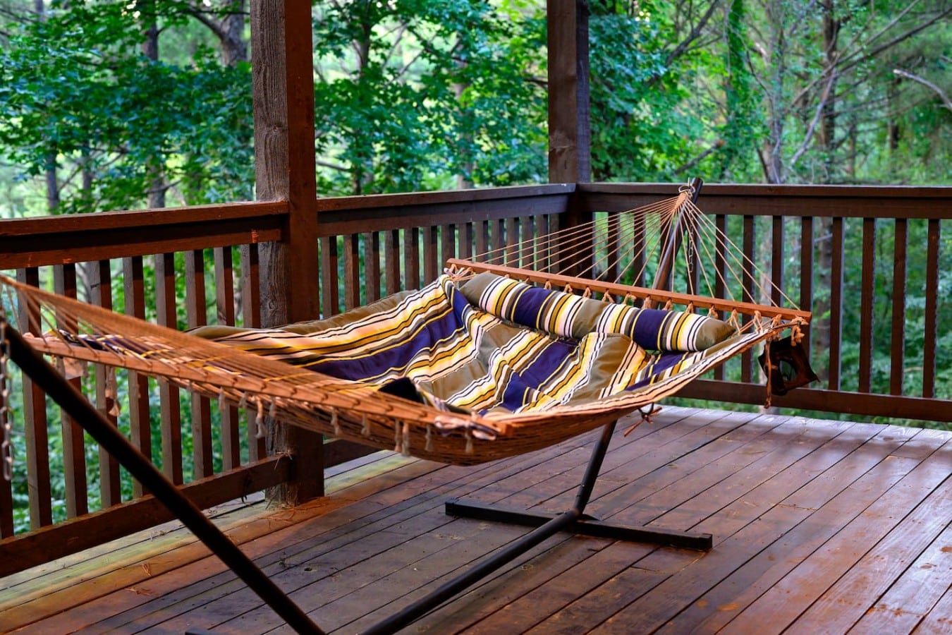 Hammock on the covered deck for a quiet place to relax in the trees.