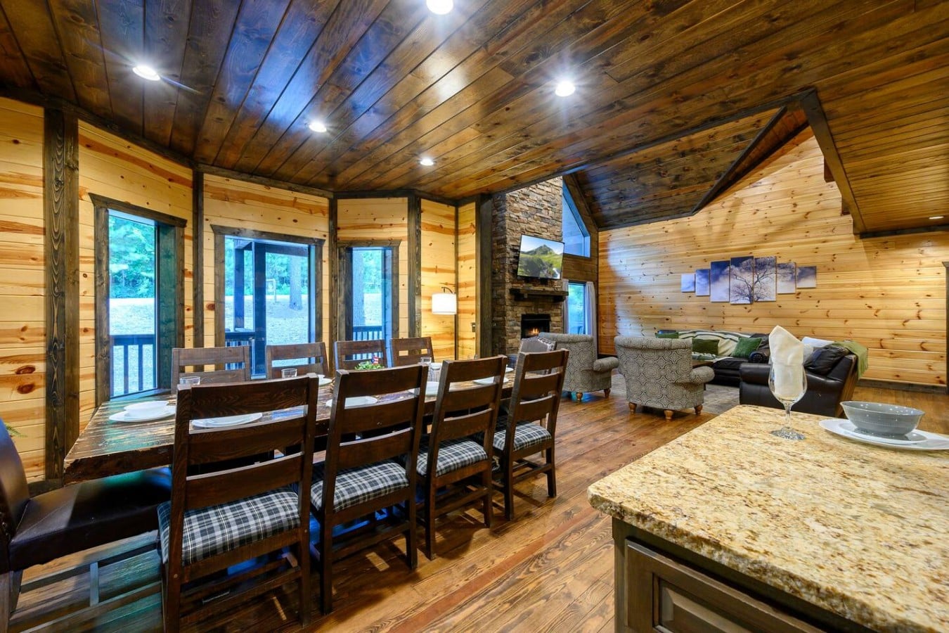 Kitchen, dining, and living spaces connected in an open layout.