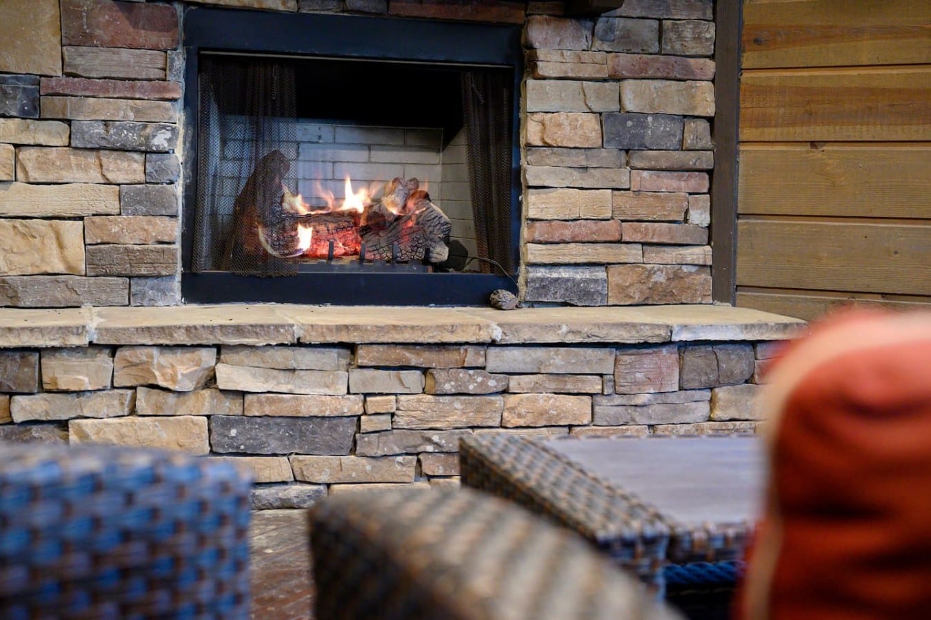 Outdoor fireplace detail on the covered deck.