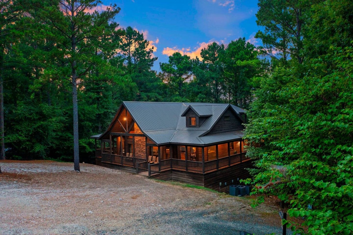 Exterior view of Boondock Ridge nestled into the forest.