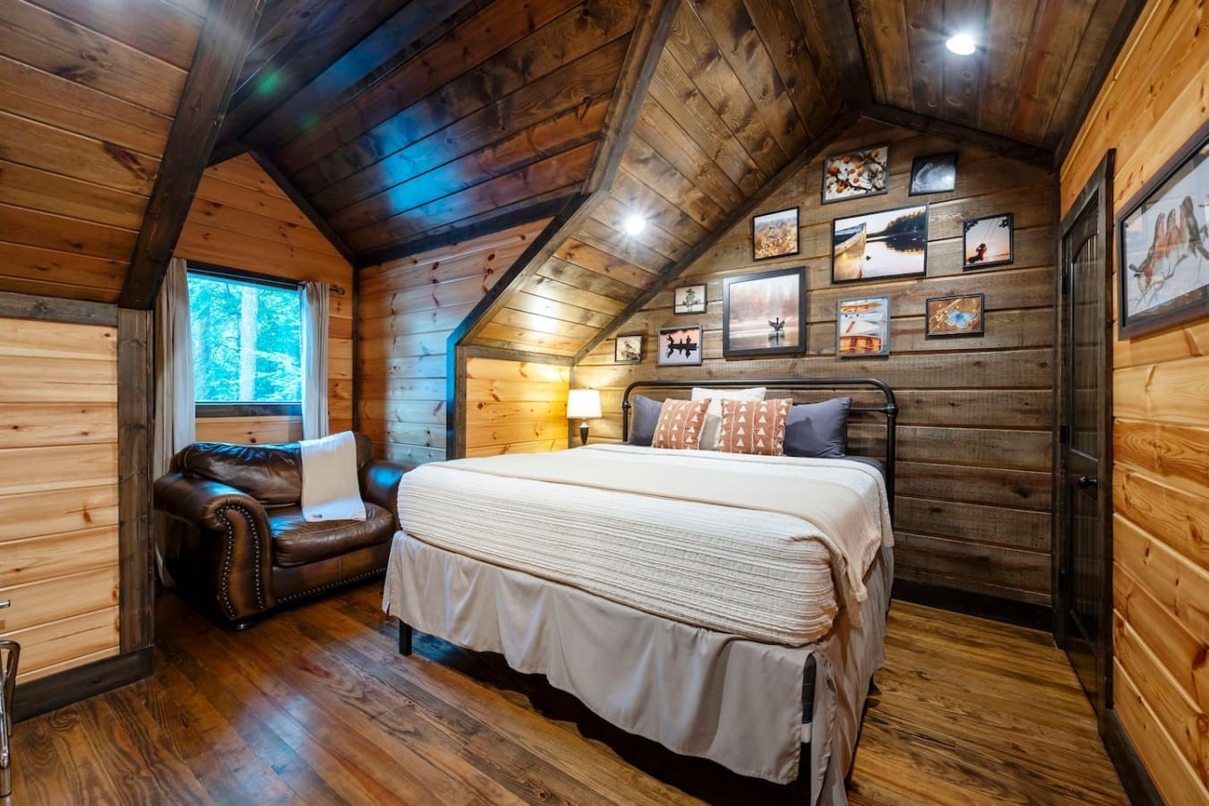 King bedroom with reading nook and gallery wall details.