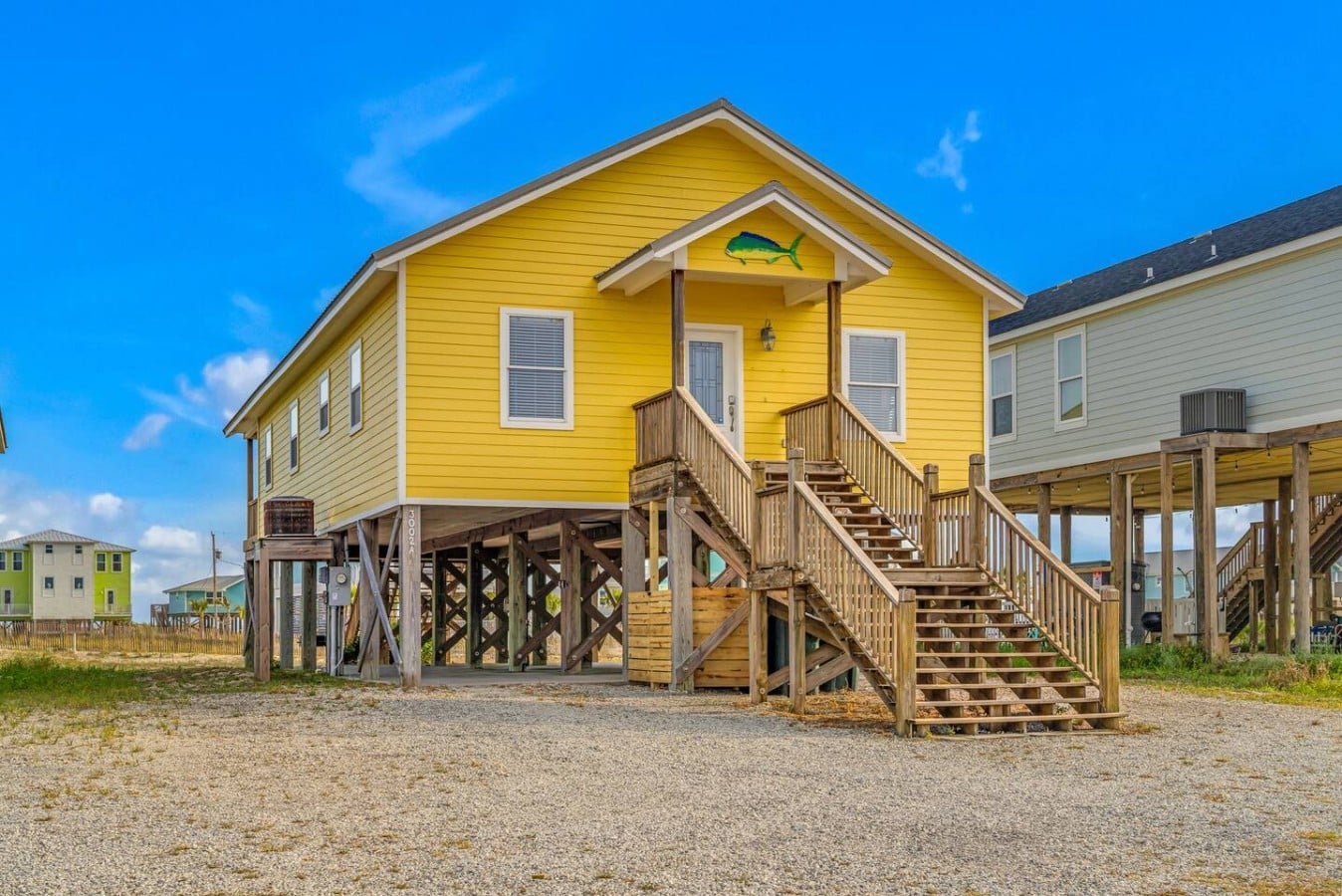 Every angle of this cheerful cottage radiates the laid-back coastal spirit you crave.