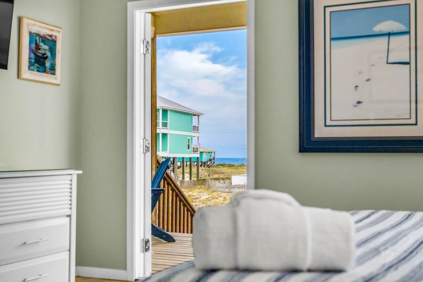 Fall asleep to sea breezes drifting through French doors framing the ocean.