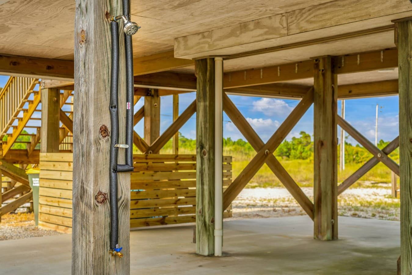 Rinse off the sand at the outdoor shower before heading inside to unwind.
