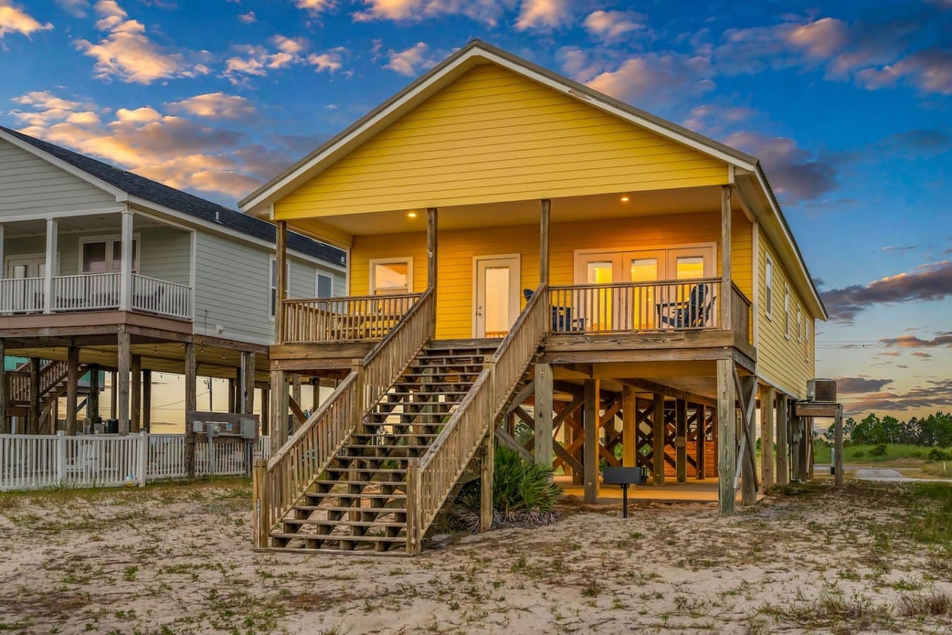 Two staircases and a glowing porch mean everyone gets a grand arrival every night.