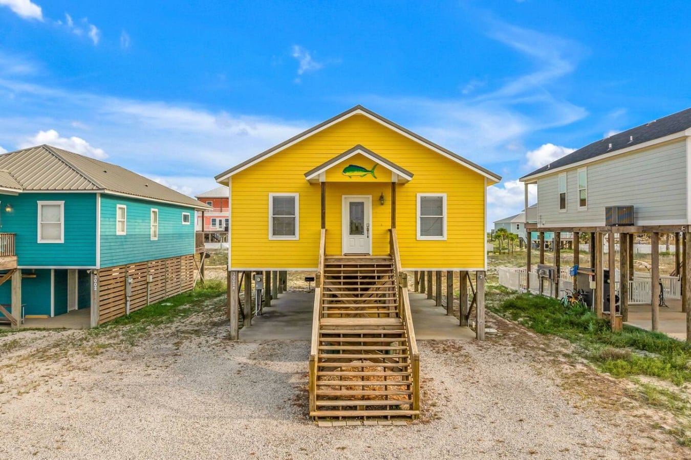 Unmistakably yours — the cheerful yellow cottage your whole crew will remember.