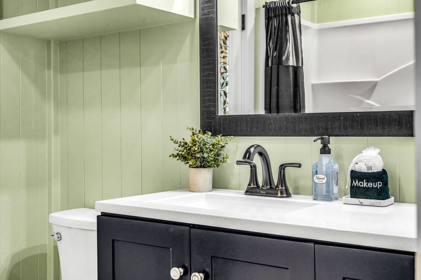 Thoughtful touches like fresh greenery and quality fixtures make every room feel like a retreat.