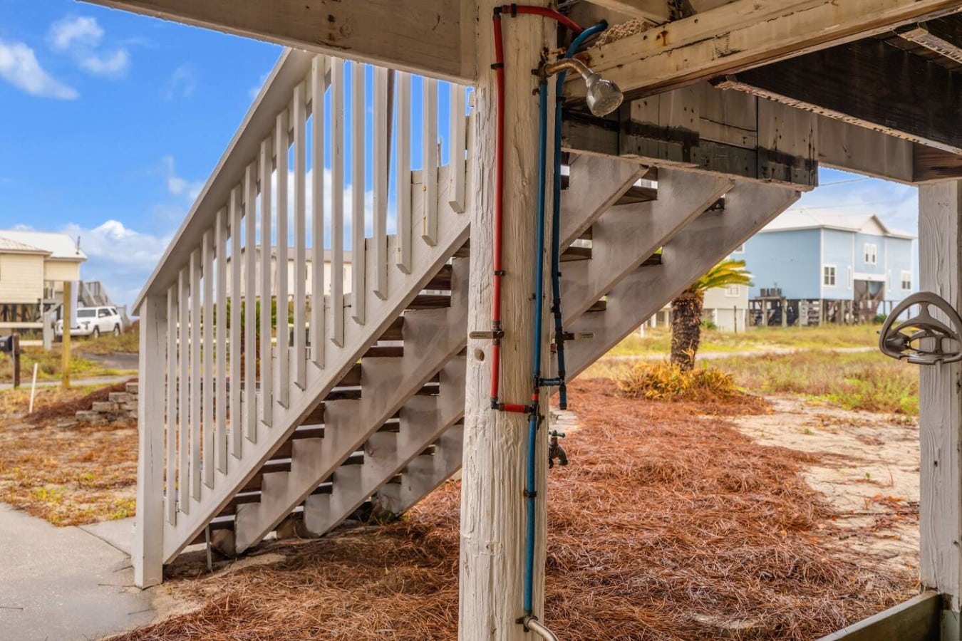 Rinse off the salt and sand in the outdoor shower before heading back inside to relax.