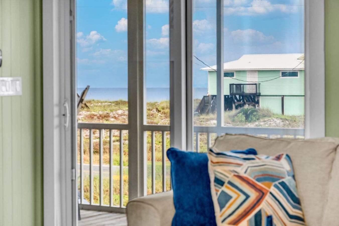 Gulf breezes and dune views greet you every time you step onto the screened porch.