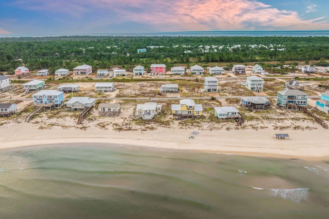 Miles of white sand and warm water await just beyond the front door of this coastal haven.