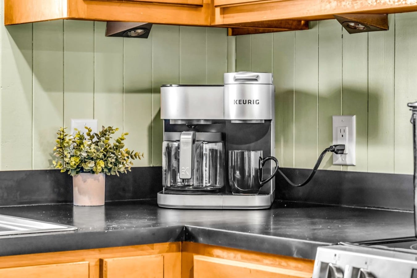 Brew your perfect cup every morning with the dual Keurig — no coffee shop run needed.