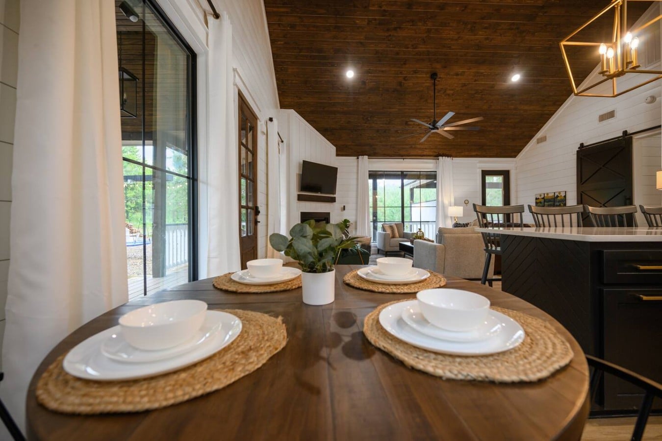 Every meal feels special at this elegant table with the fireplace glowing behind you.