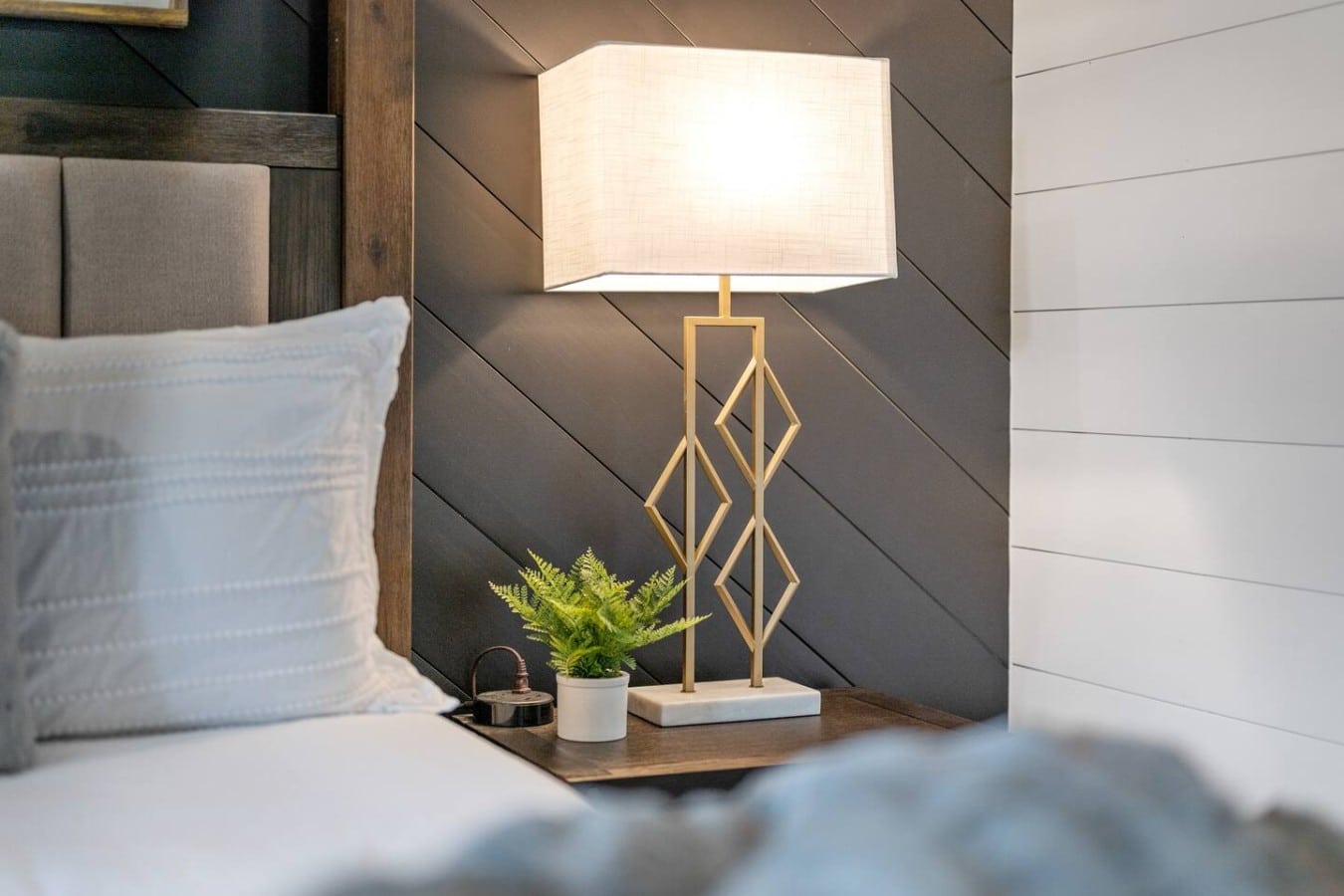 Thoughtfully chosen gold accents and lush greenery make every corner of this cabin feel curated.