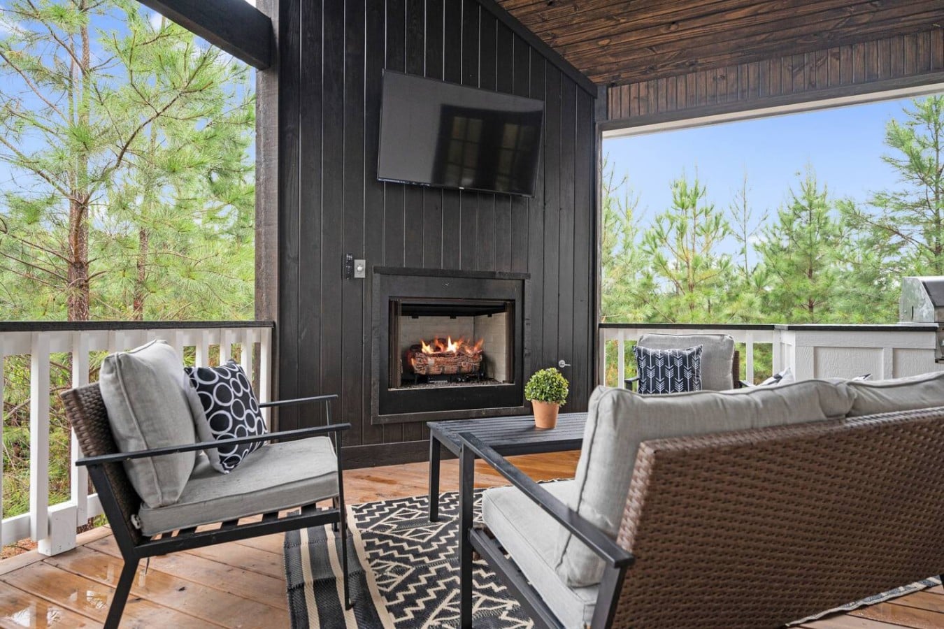 Curl up beside the roaring fireplace and let the forest views melt your stress away.