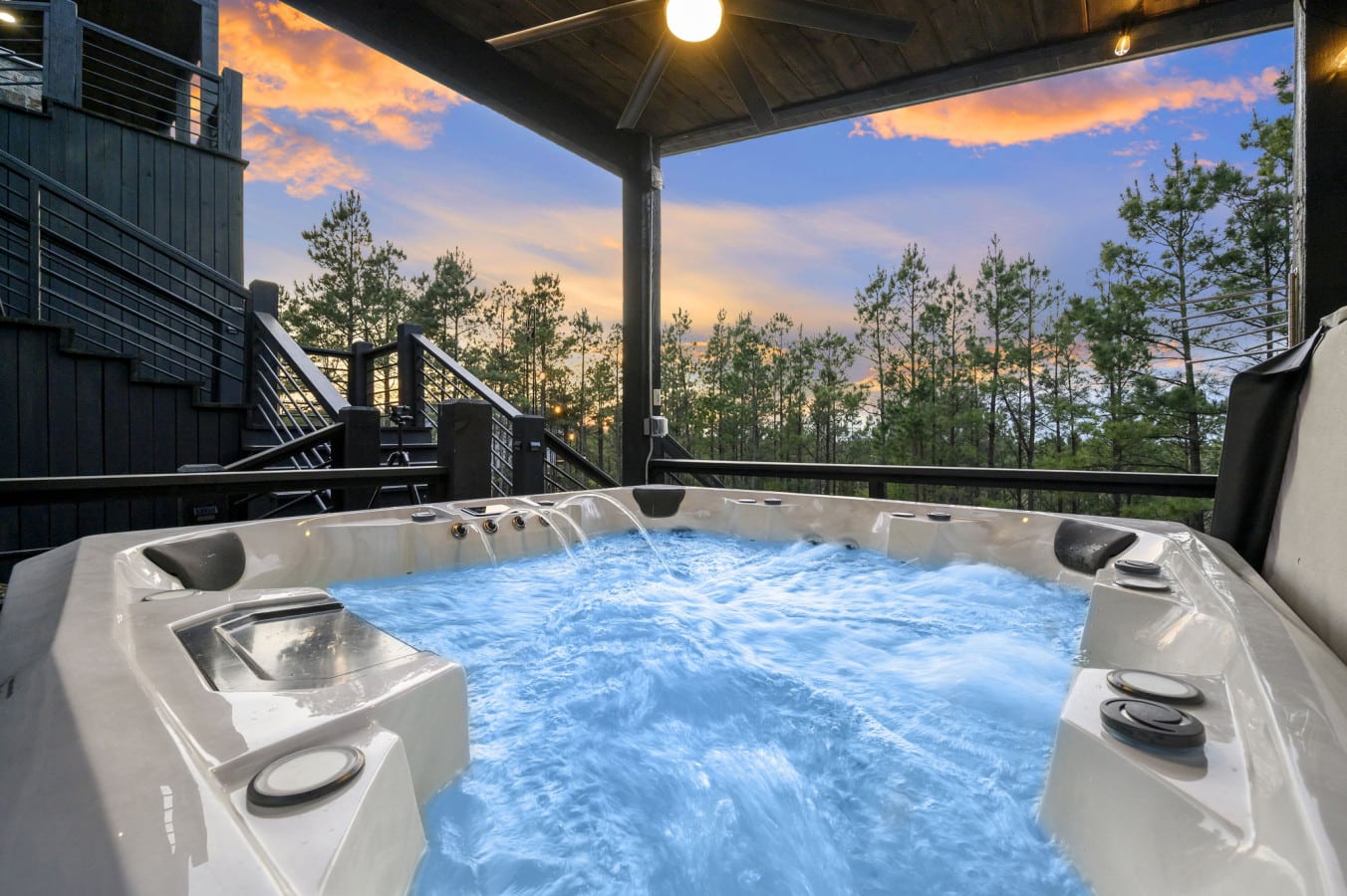 Soak away the day in bubbling jets while pine forest sunsets unfold before you.