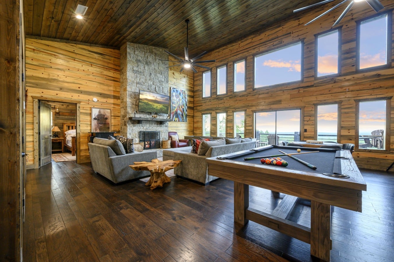 Rack 'em up beside the fire while a jaw-dropping sunset lights up the windows.