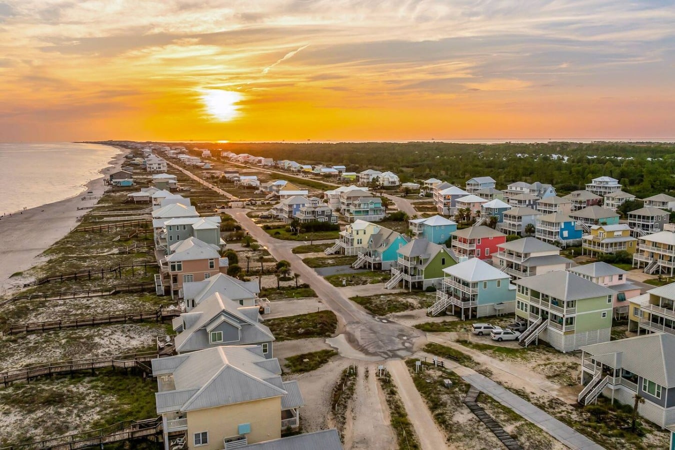 Watch the sun melt into the Gulf from a home that puts you right in the fire.