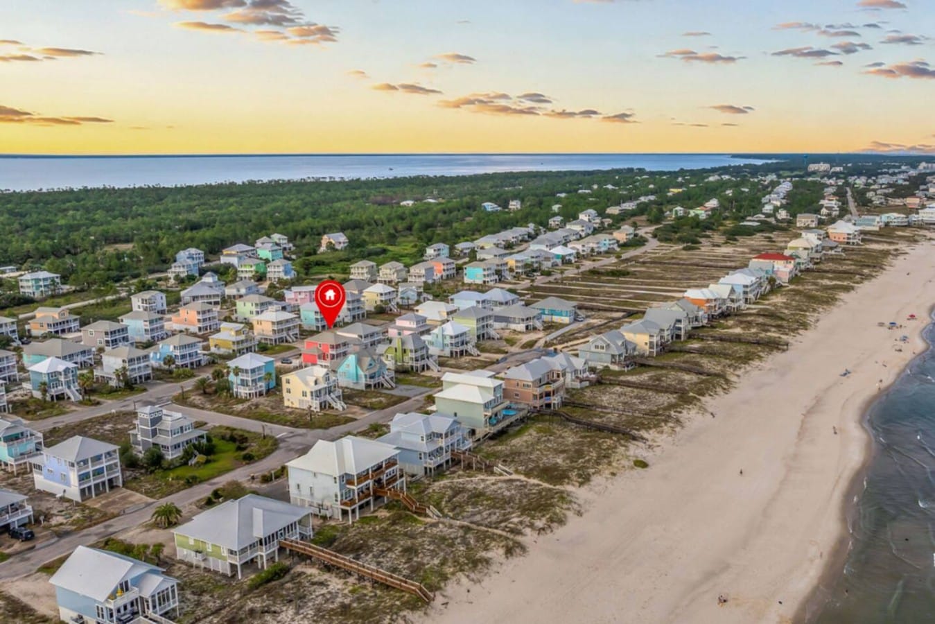 Two rows from the white-sand beach — close enough to hear the waves at night.