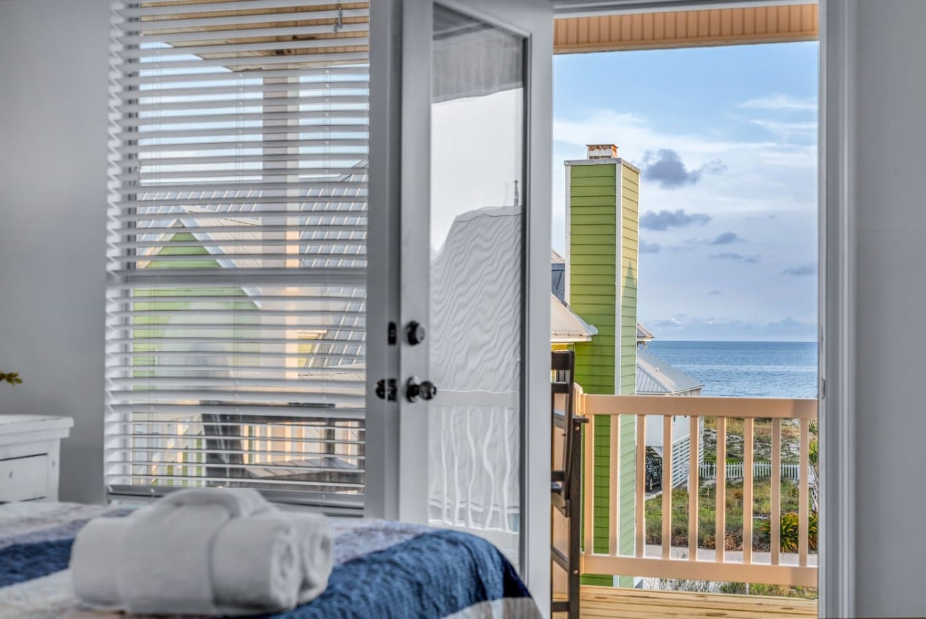 Throw open the French doors and let the Gulf horizon become your morning view.