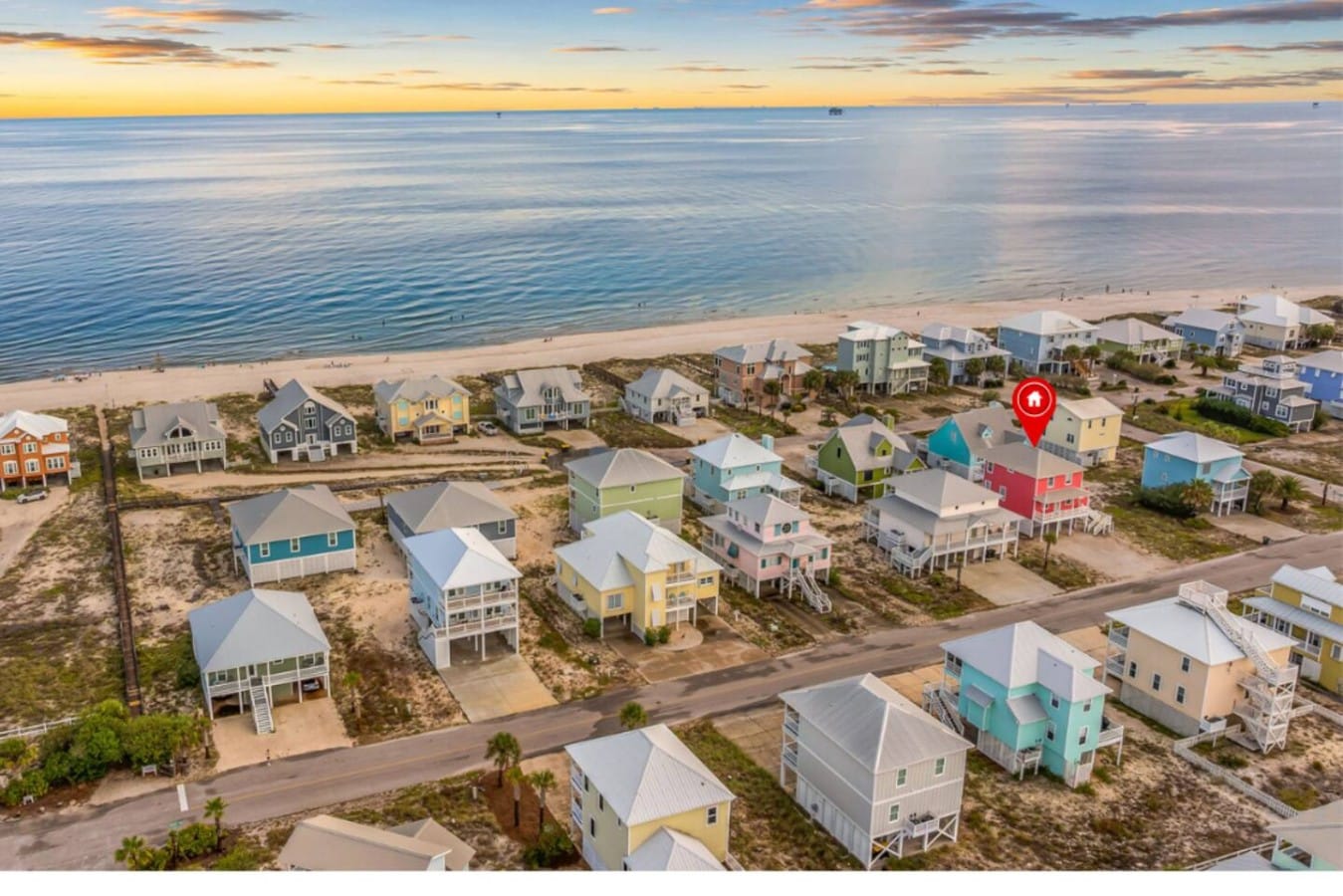 Steps from the Gulf — your beachfront escape glows at golden hour.