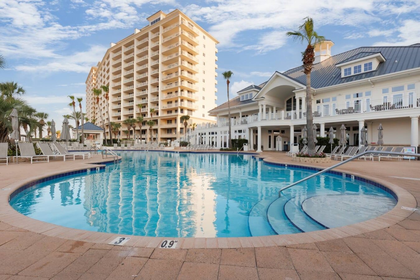 Dive into resort luxury with a grand pool just steps from the beachfront.