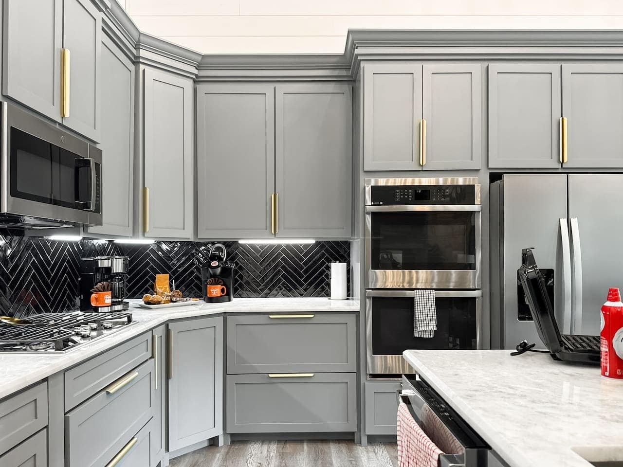 Under-cabinet lighting and a gas cooktop make this kitchen as functional as it is gorgeous.