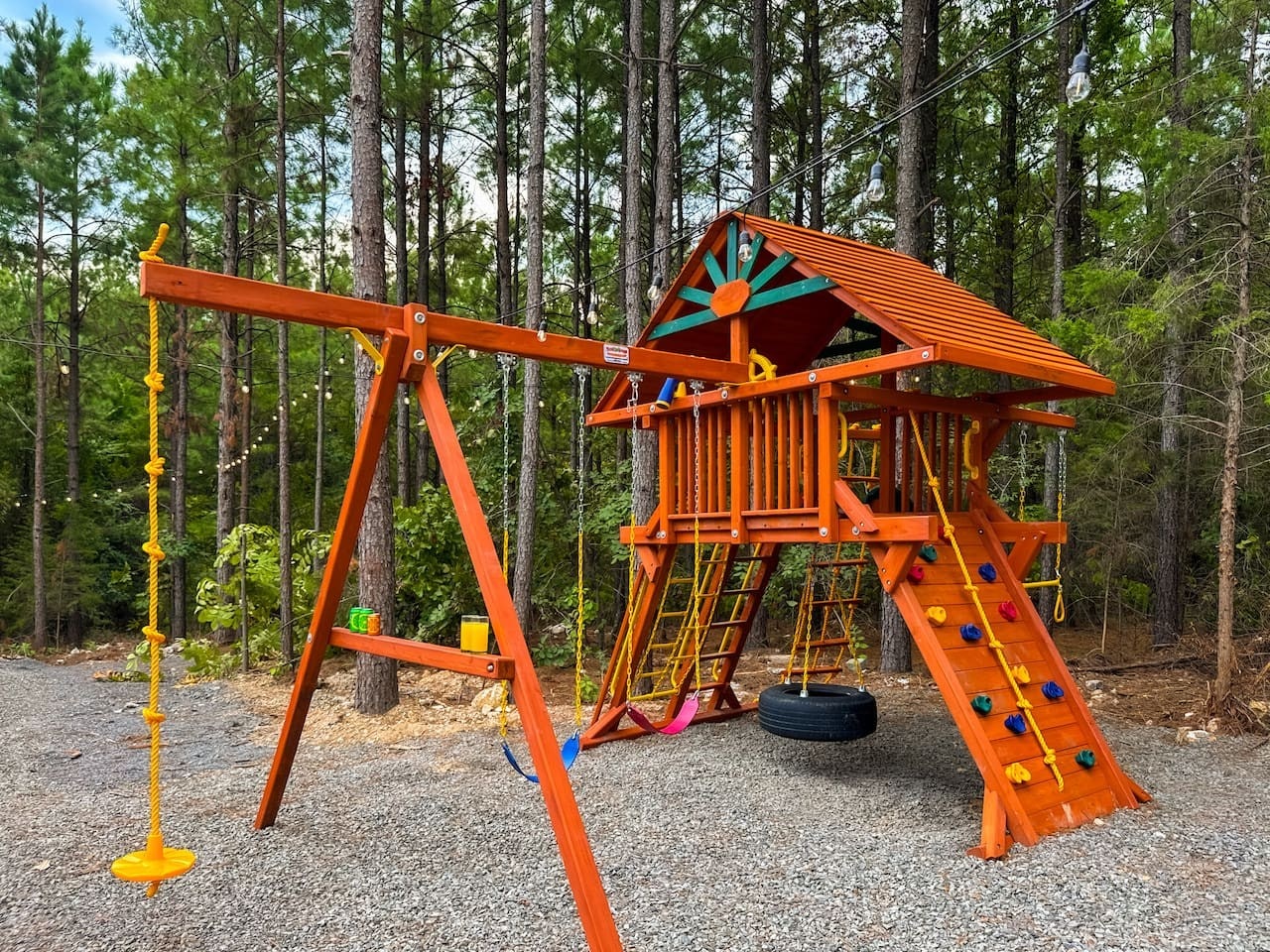 Kids will spend hours on the fort, tire swing, and climbing wall out back.
