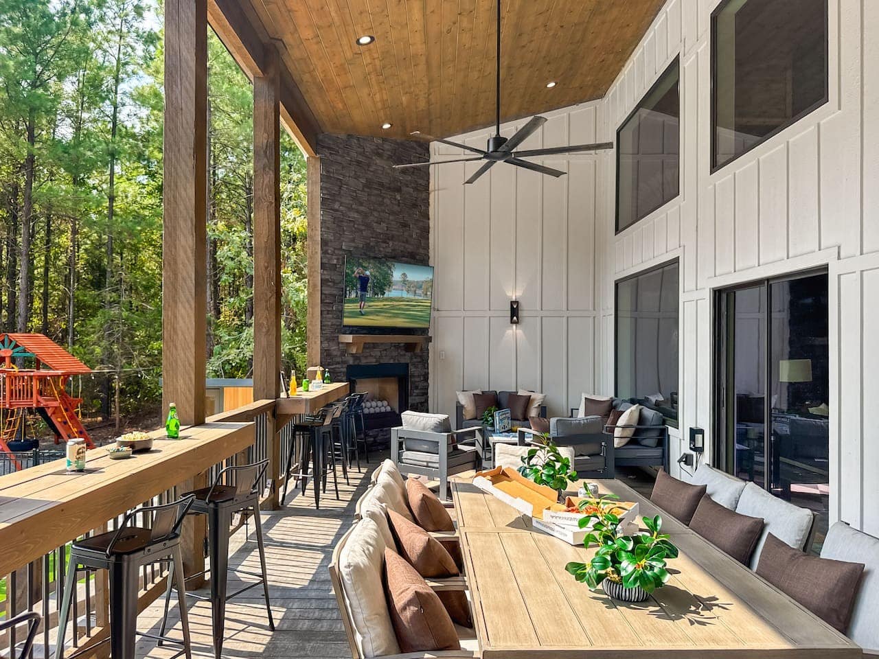Dine, lounge, and watch a game without ever leaving this resort-style outdoor living room.