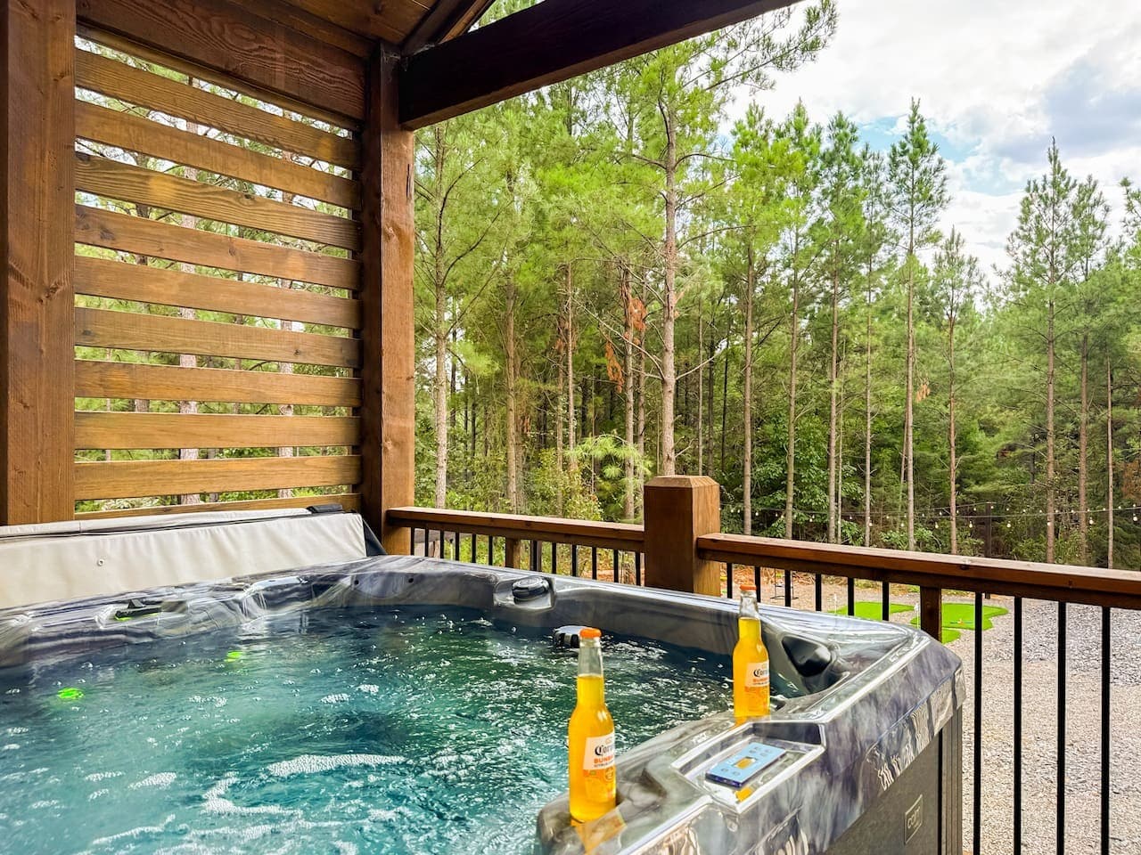 Crack open a cold one in the bubbling hot tub as pines sway all around you.