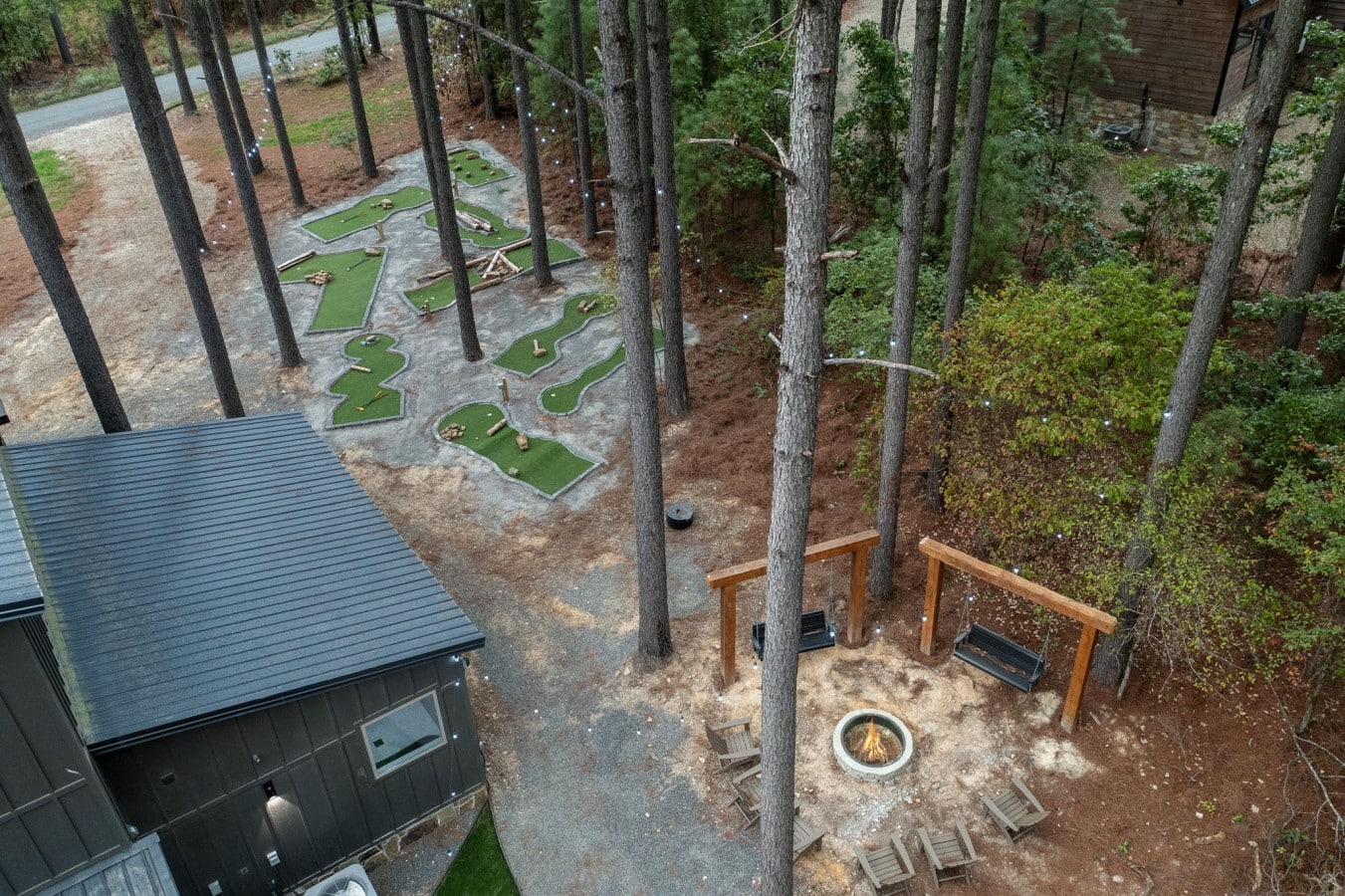 Tee off through the pines, then unwind fireside under the open sky.