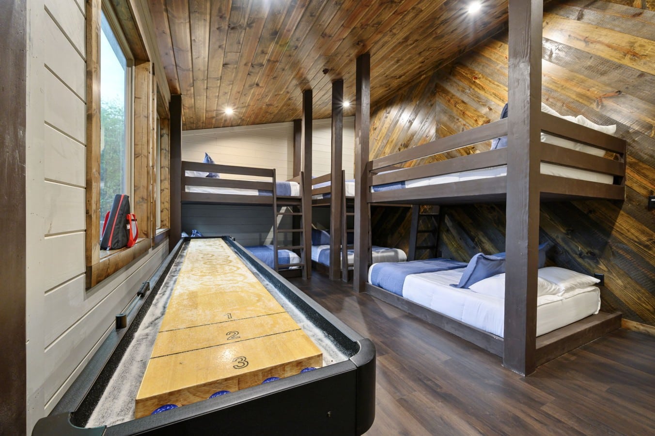 Bunk down and challenge someone to shuffleboard without ever leaving the bedroom.