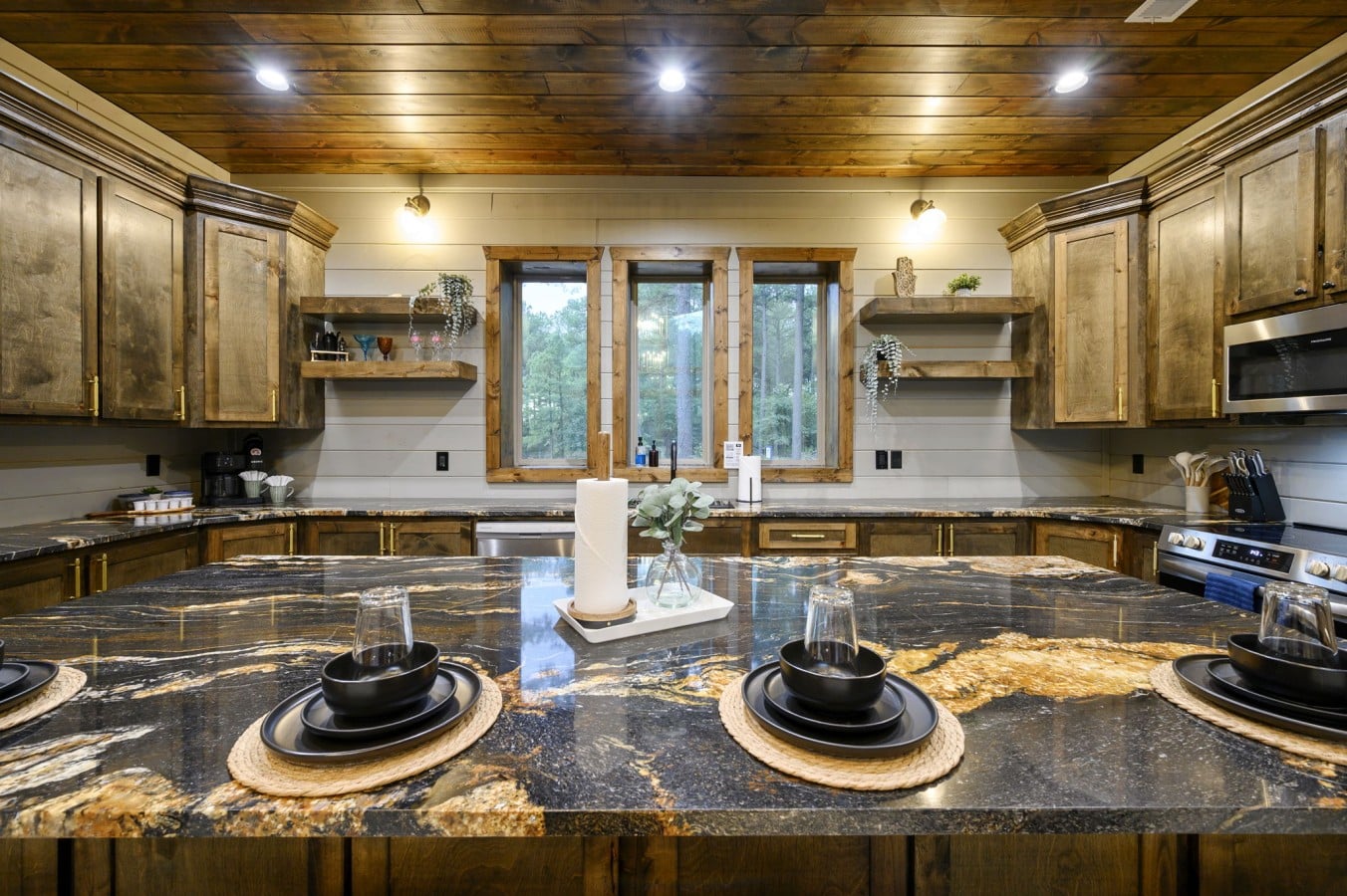 Forest views frame a kitchen so beautiful you'll want to cook every night.