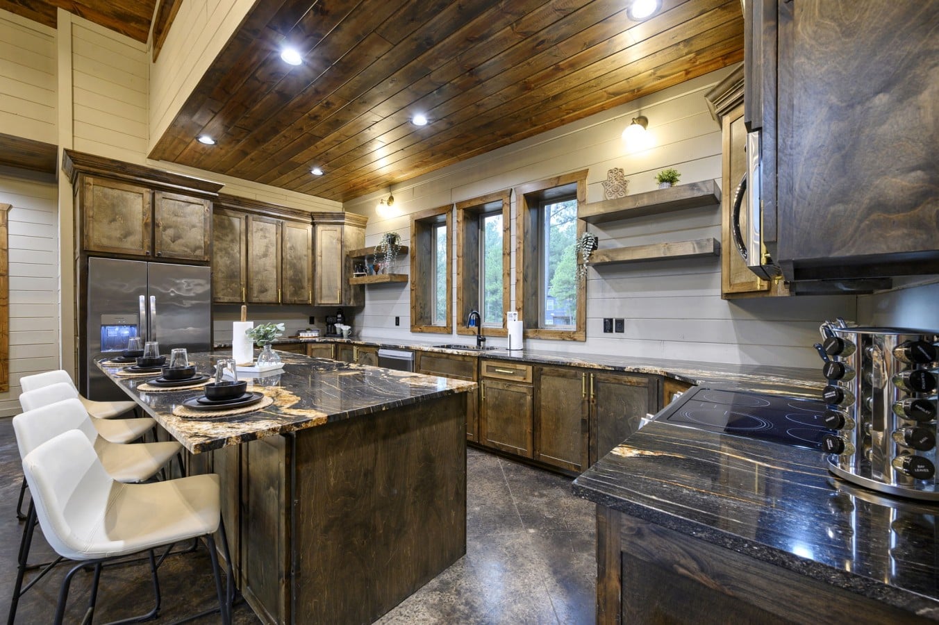 Dark cabinetry and granite counters give this kitchen serious wow factor.